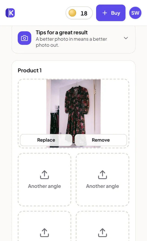 A phone photo of a floral dress on a hanger added as the product photo, with four empty slots for more angles